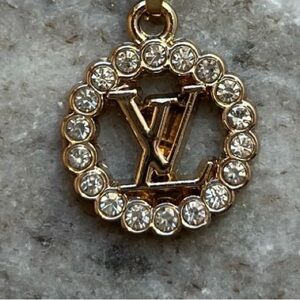 Upside zipper pull bracelet charm